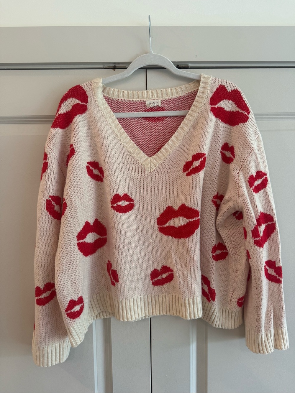 POL Cream V-Neck Sweater with Red Lip Motif